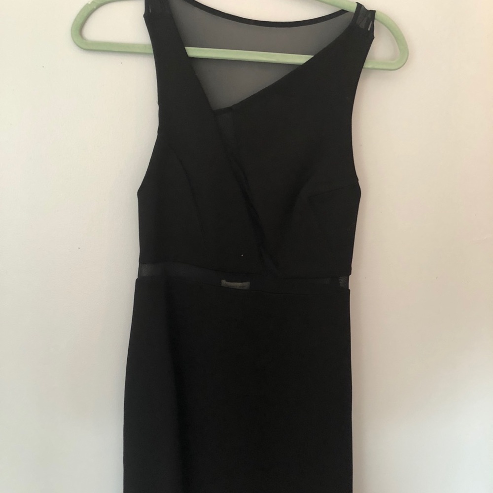 Black bodycon dress with mesh areas, asymmetrical